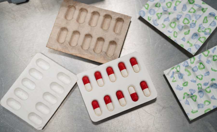 Several blister packs made with dry molded fiber.